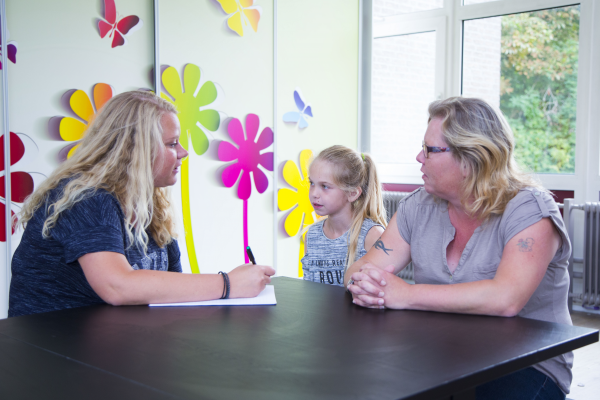 How do I schedule an appointment with school social services?
